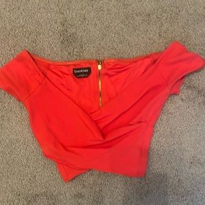 Bebe bright red/orange cropped top with gold zipper XS